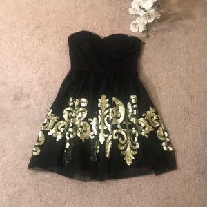 Black strapless gold sparkly dress